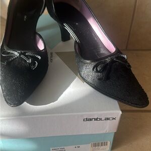 DaniBlack calf hair 
2in heel 
Patent trim 6M
Gorgeous like new.